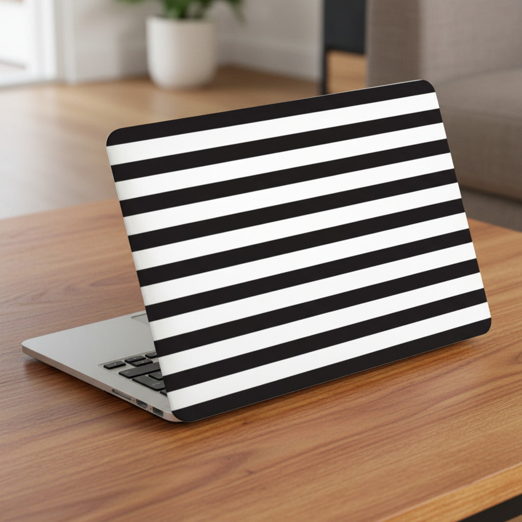 Side View of Black and white striped pattern MacBook case on a MacBook with white background.