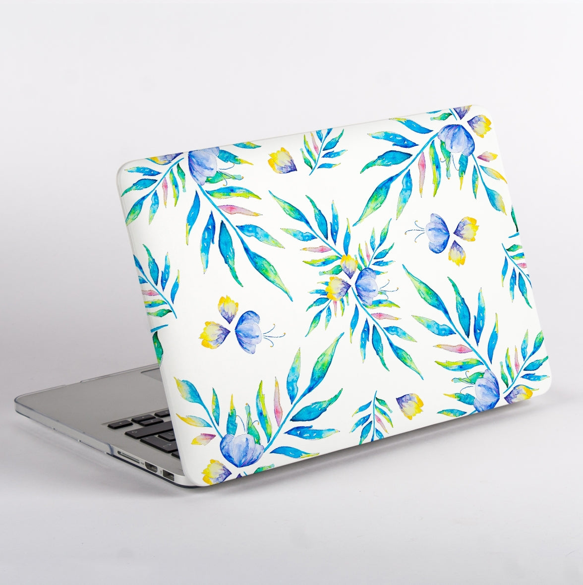 Side View MacBook with a colorful leaf and butterfly pattern Laptop Case on a white background