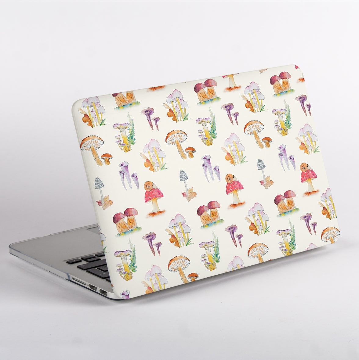 Side View Macbook with a colorful mushroom pattern case on a white background