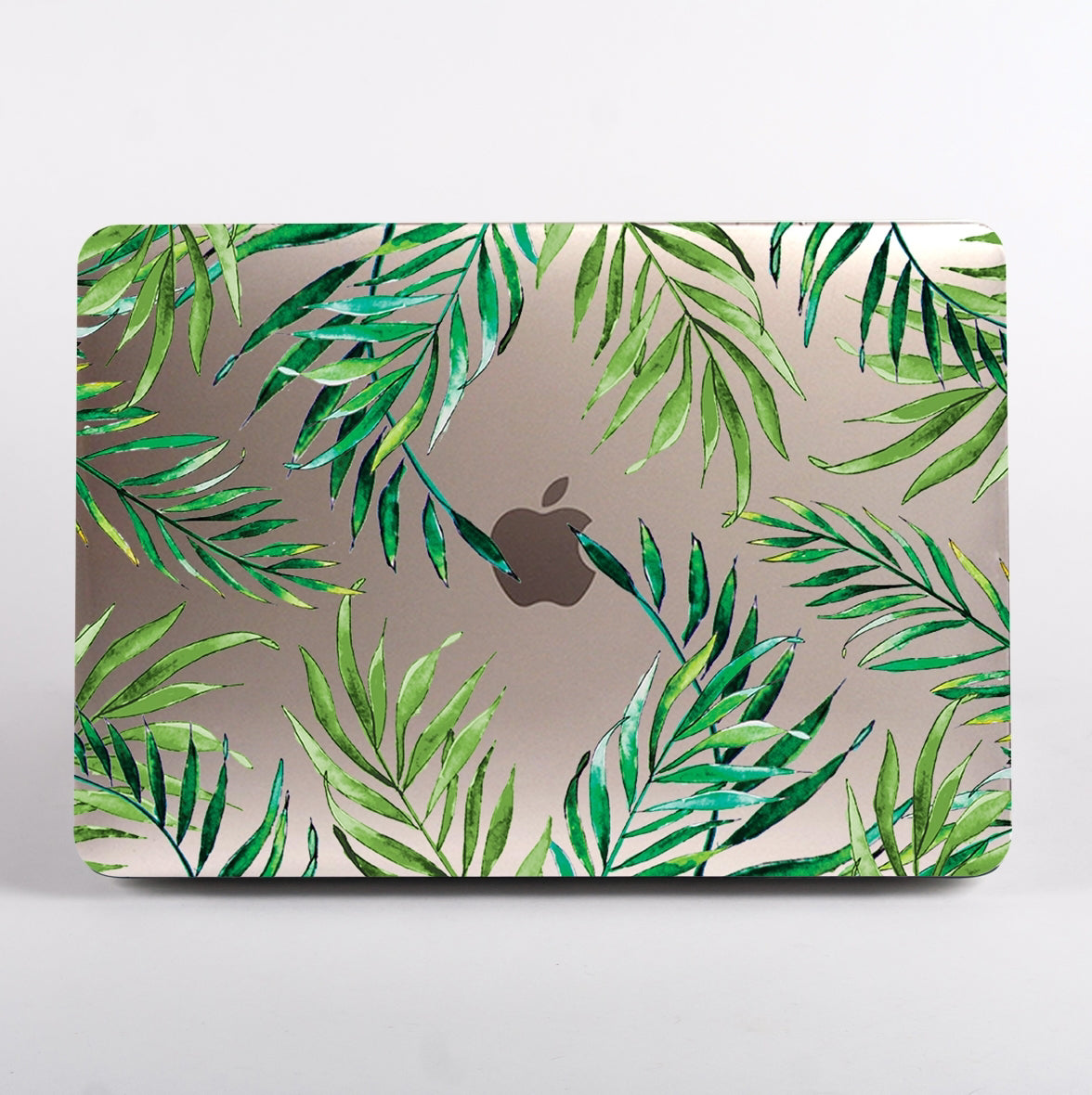 MacBook with green leaf pattern on a clear case.