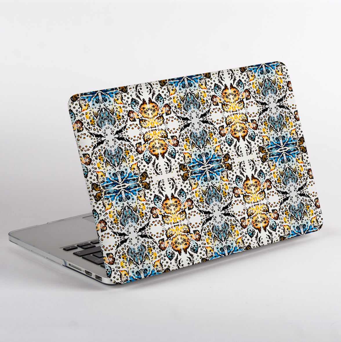 MacBook with colorful kaleidoscopic animal patterned case