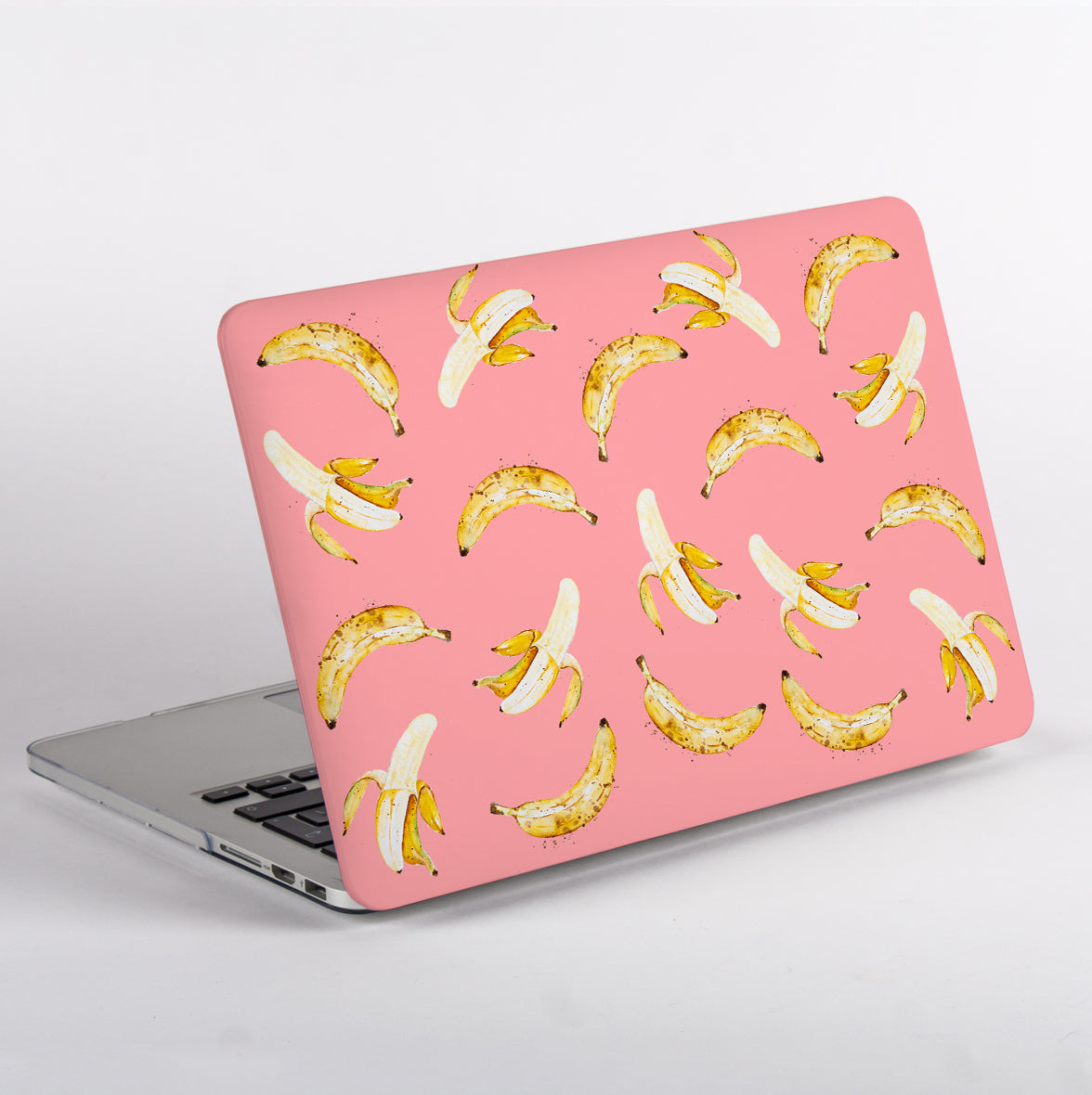 MacBook with a pink banana pattern Case