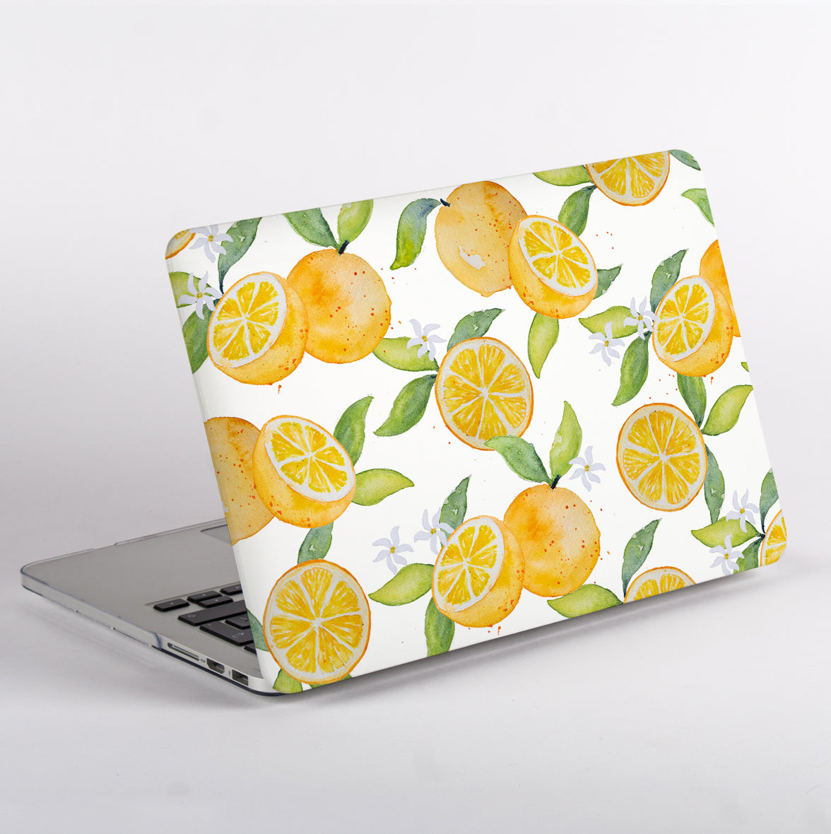 MacBook with an Oranges patterned cover