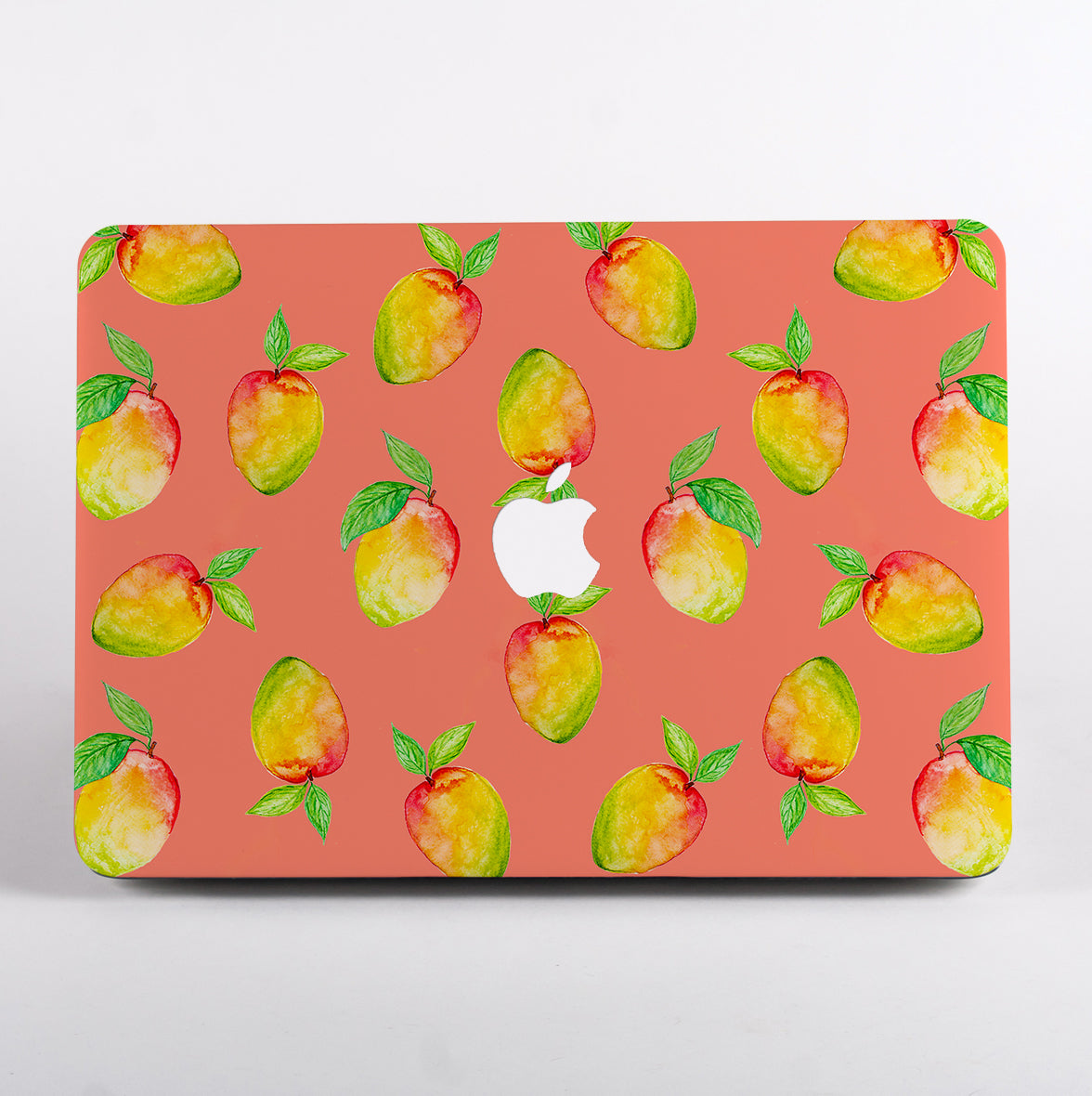 MacBook with a peach patterned case