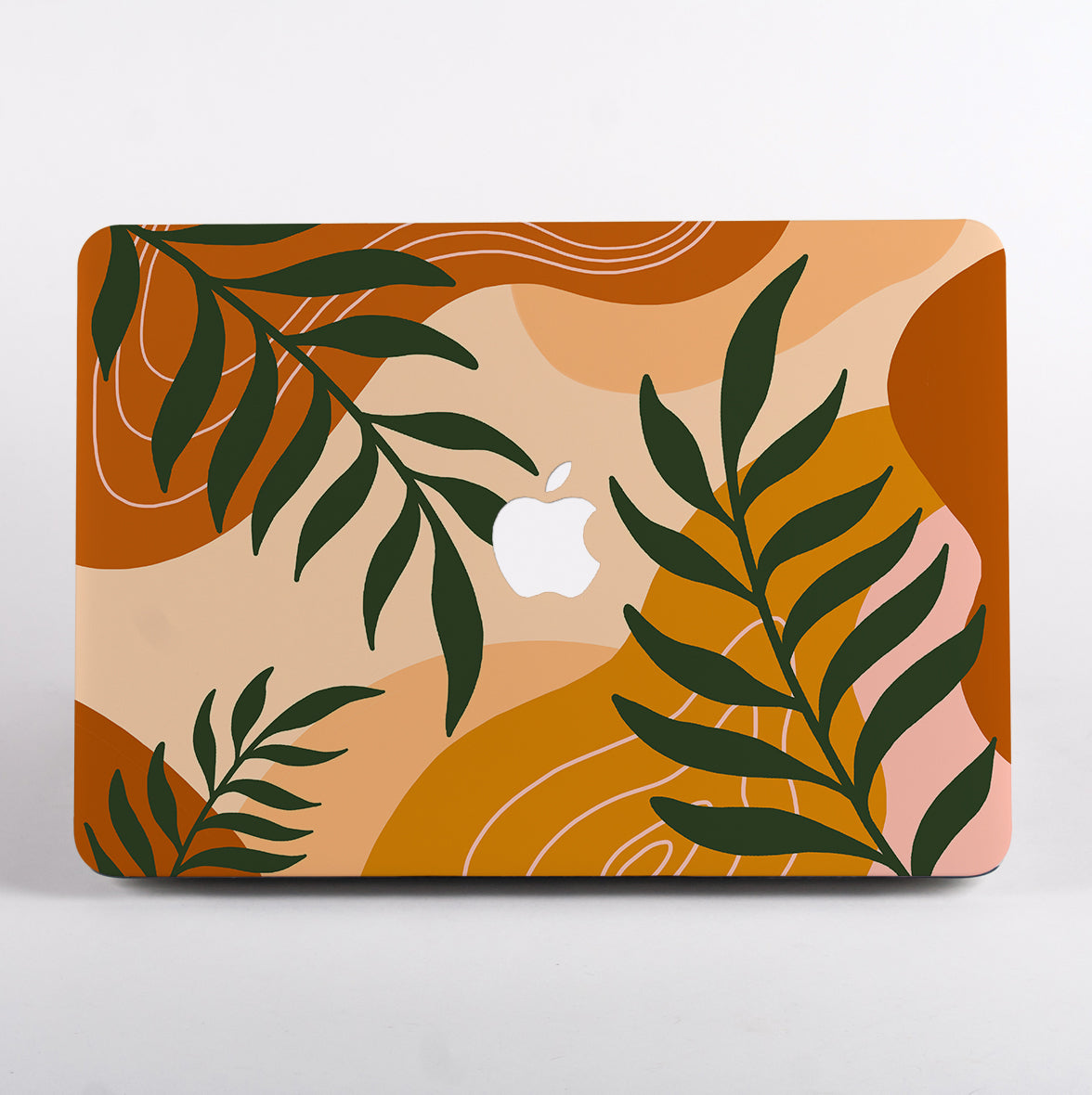 MacBook Air with abstract botanical art case.