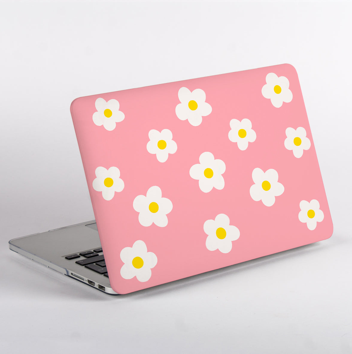 MacBook with pink daisy floral pattern case