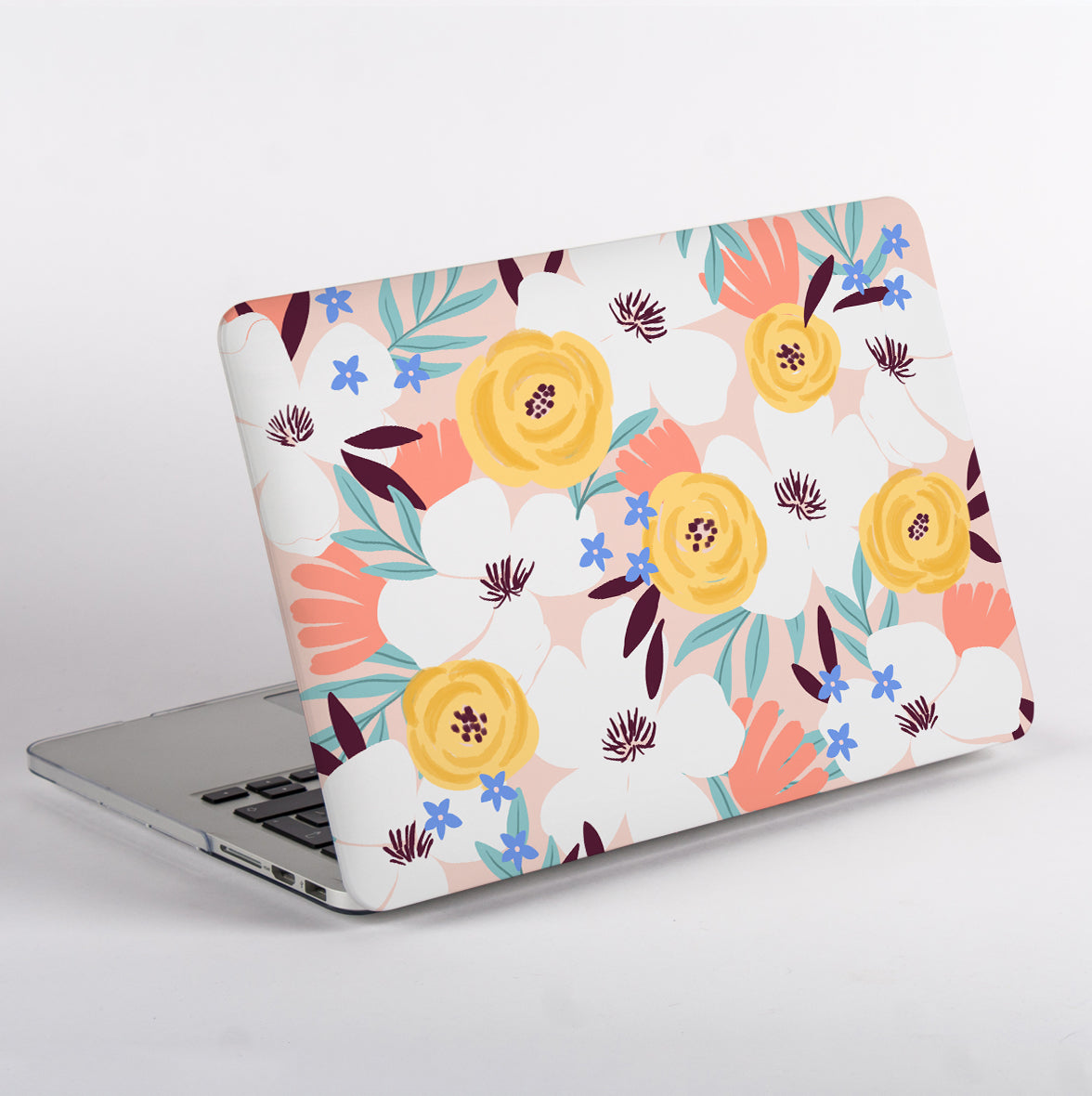 Side View of Floral laptop case with Apple logo on a MacBook Air
