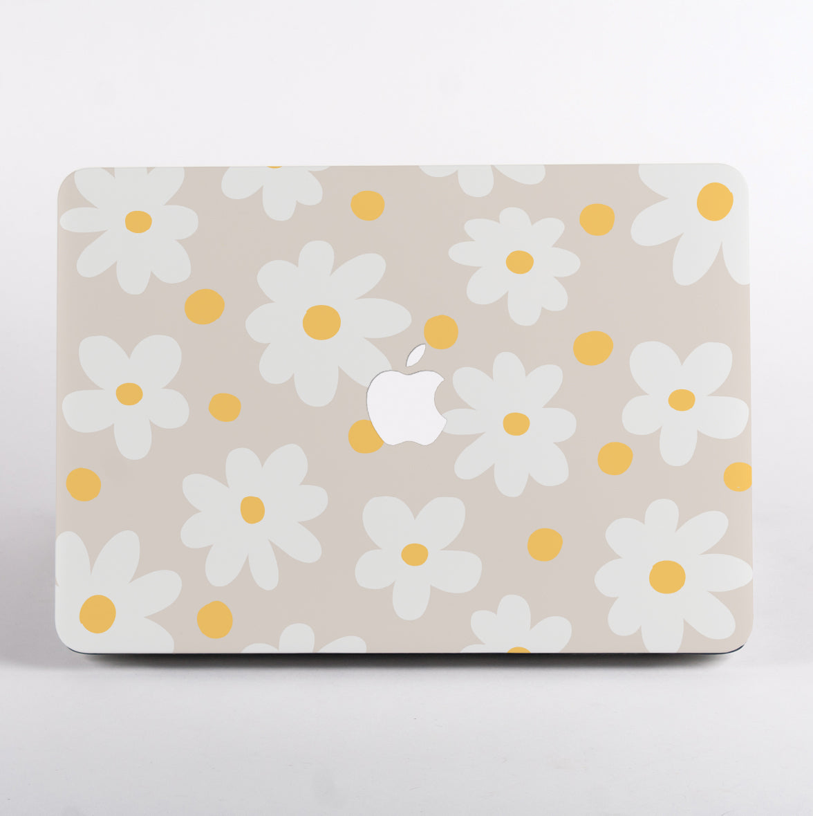 Daisy Floral laptop case with Apple logo on a MacBook Air