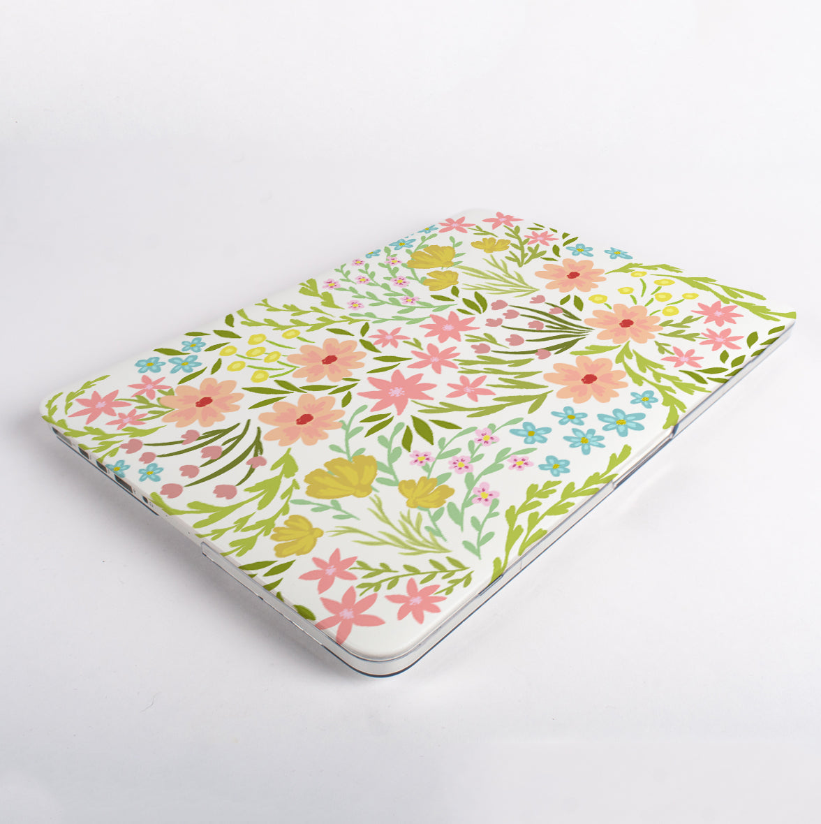 Top view of Spainsh Flowers floral macbook case on a macbook