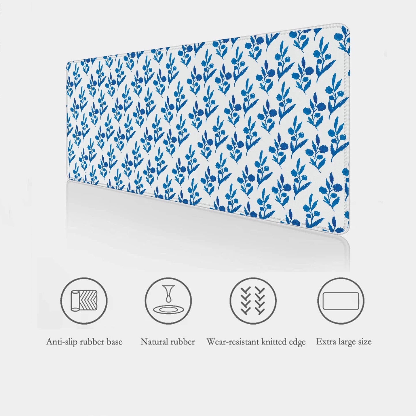 White desk mat with blue floral pattern on a white background