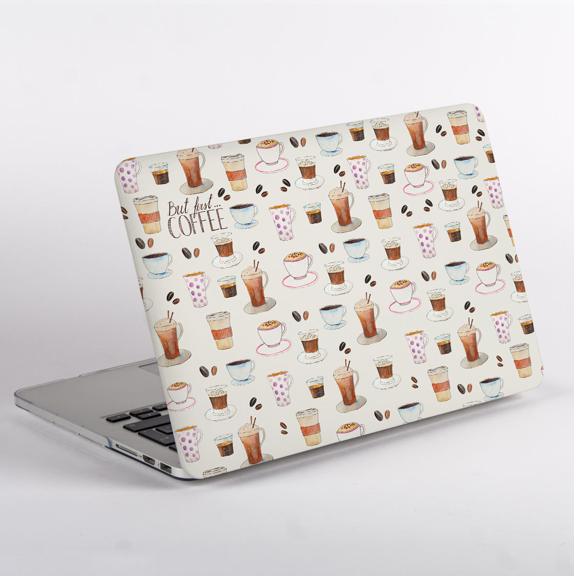 Side view of MacBook with a coffee-themed case on a white background