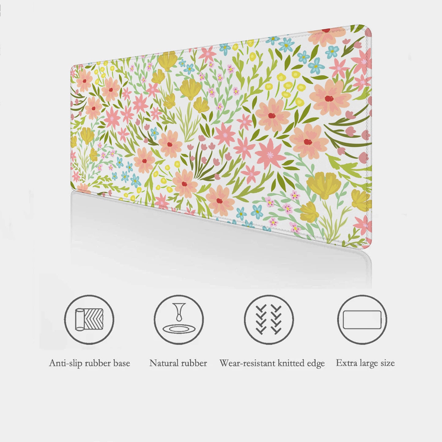 Floral desk mouse pad highlighting the product features listed below -smooth surface, non-slip base made from natural rubber and stitched edges  — floral, padded, and durable.