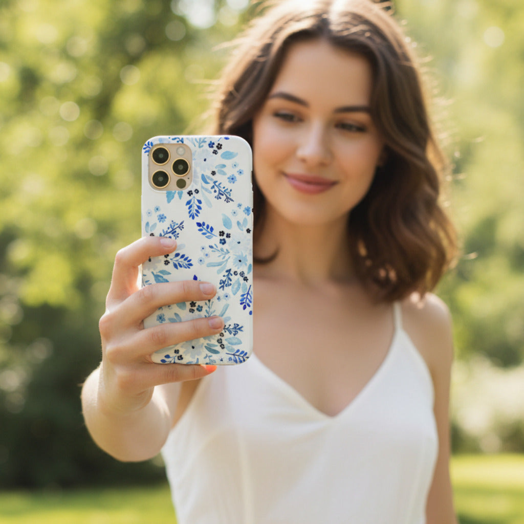 Blue floral designer phone case — protective, matte finish case featuring hand-painted watercolour blue flowers.