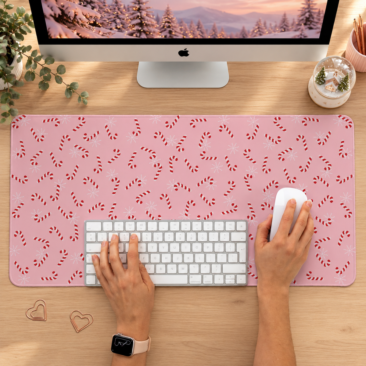 Pink Christmas desk mat on a festive home office desk