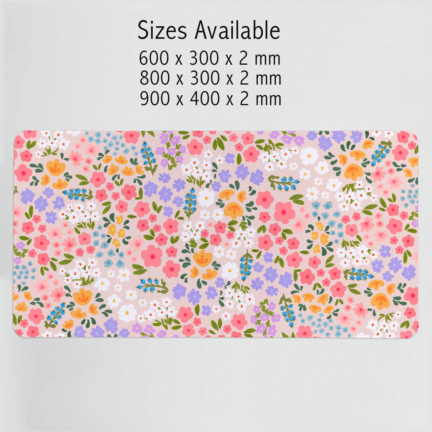 Floral patterned desk mat with size specifications on a light gray background