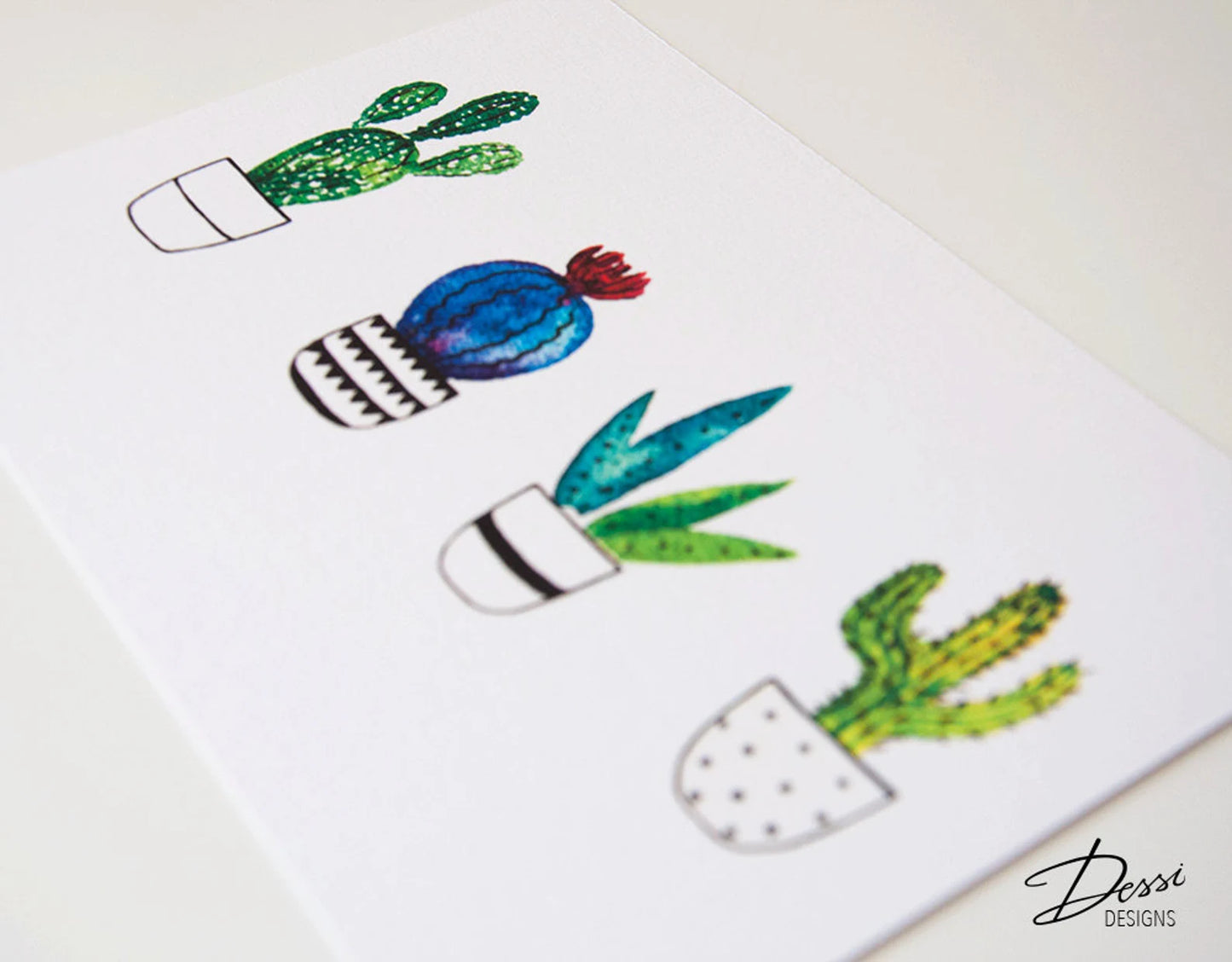 Colorful cactus illustrations on a white background with 'Dessy Designs' branding.