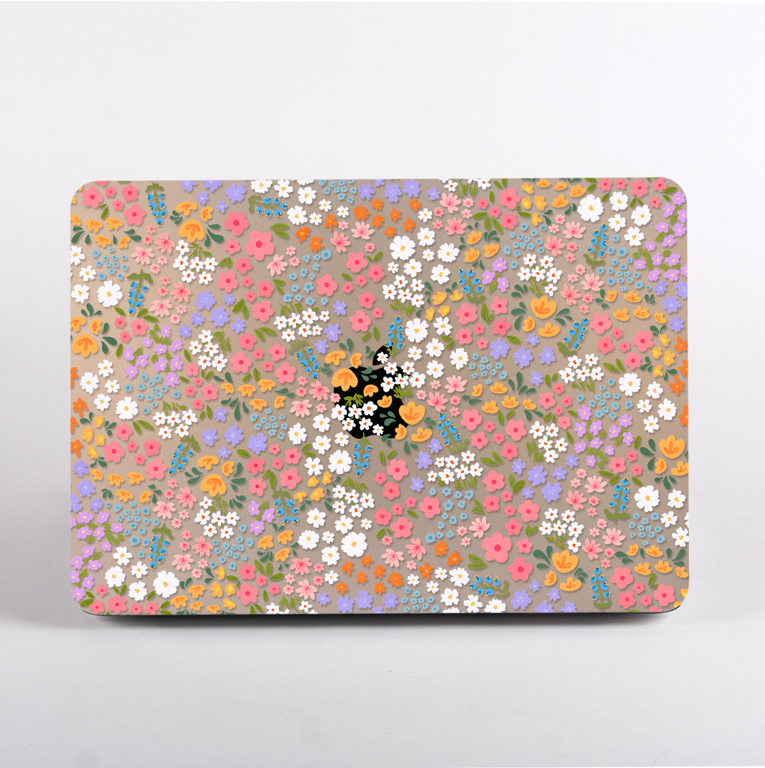 Clear MacBook Case with a vibrant floral print . Available at www.dessi-designs.com