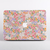 Cute MacBook Case with a vibrant floral print . Available at www.dessi-designs.com