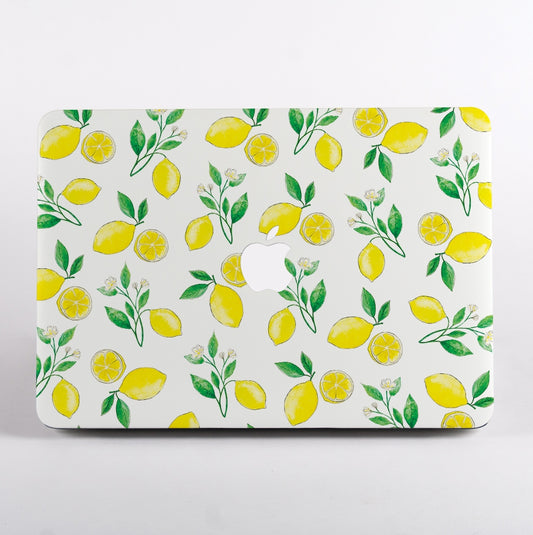 MacBook with a lemon pattern MacBook Case on a white background