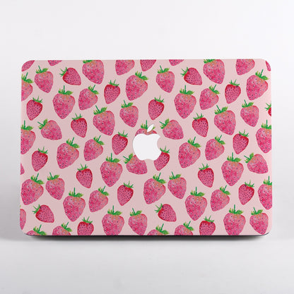 MacBook with a strawberry pattern MacBook Case on a pink background
