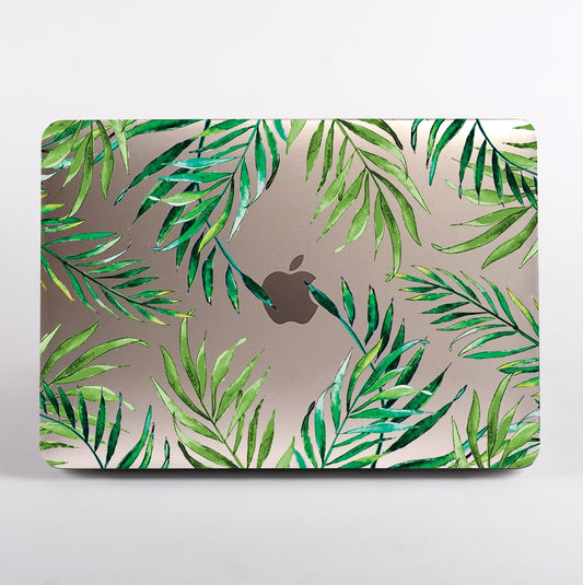 MacBook with green leaf pattern on a clear case.
