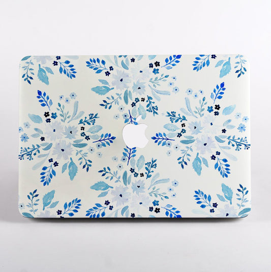 MacBook with blue floral pattern case with logo on a white background