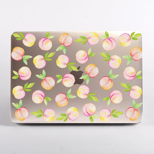MacBook with a peach patterned clear case