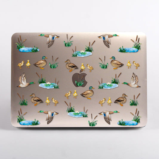 MacBook with a duck-themed clear case 