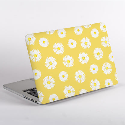 MacBook Pro with a yellow daisy patterned MacBook Case