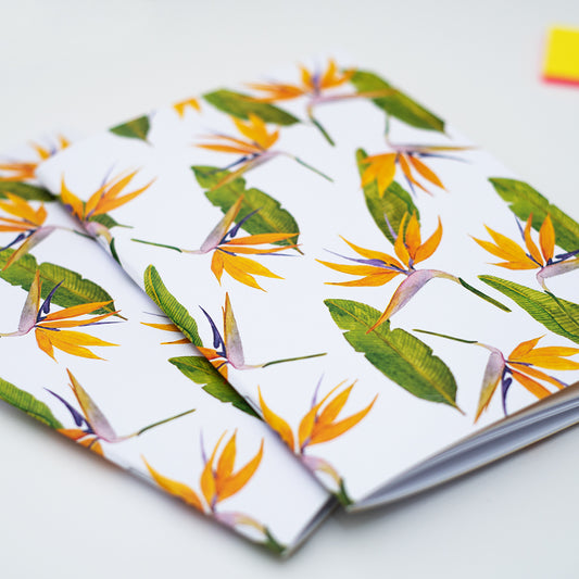 Notebook with a tropical flower pattern on a white background