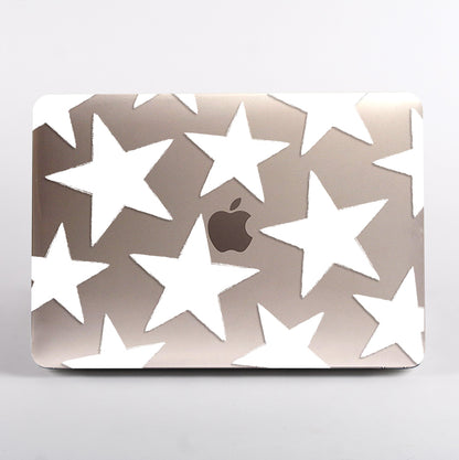 MacBook with large white star pattern clear case