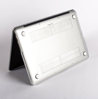 Back view of a MacBook Pro with a clear case