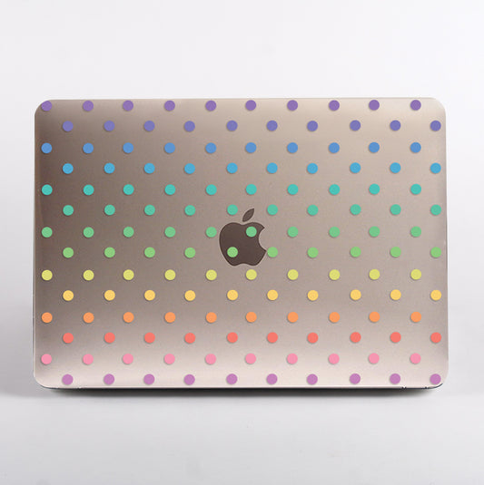 MacBook with colorful polka dot MacBook Case