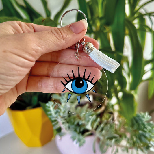 Clear acrylic keyring with Evil Eye design, perfect for keeping keys organised.
