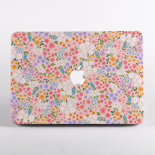 Cute Floral patterned macbook case with Apple logo on a macbook air