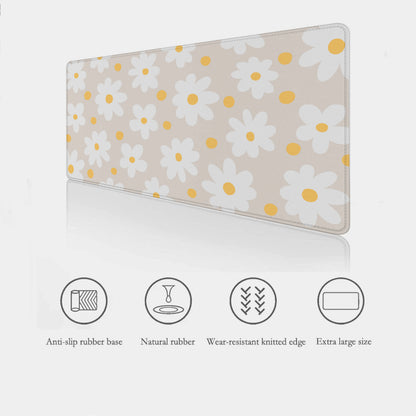 Beige Daisy Desk Mat highlighting the features - anti-slip rubber base, stitched edges and extra large sizes.