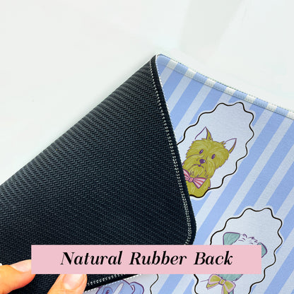 Close-up of blue dog striped desk mat with rubber back