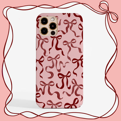 Cute Christmas phone case with pretty ribbon design on a soft pink background. A stylish, protective phone case for iPhone, Samsung, and Google Pixel — perfect for the holidays or all-year charm