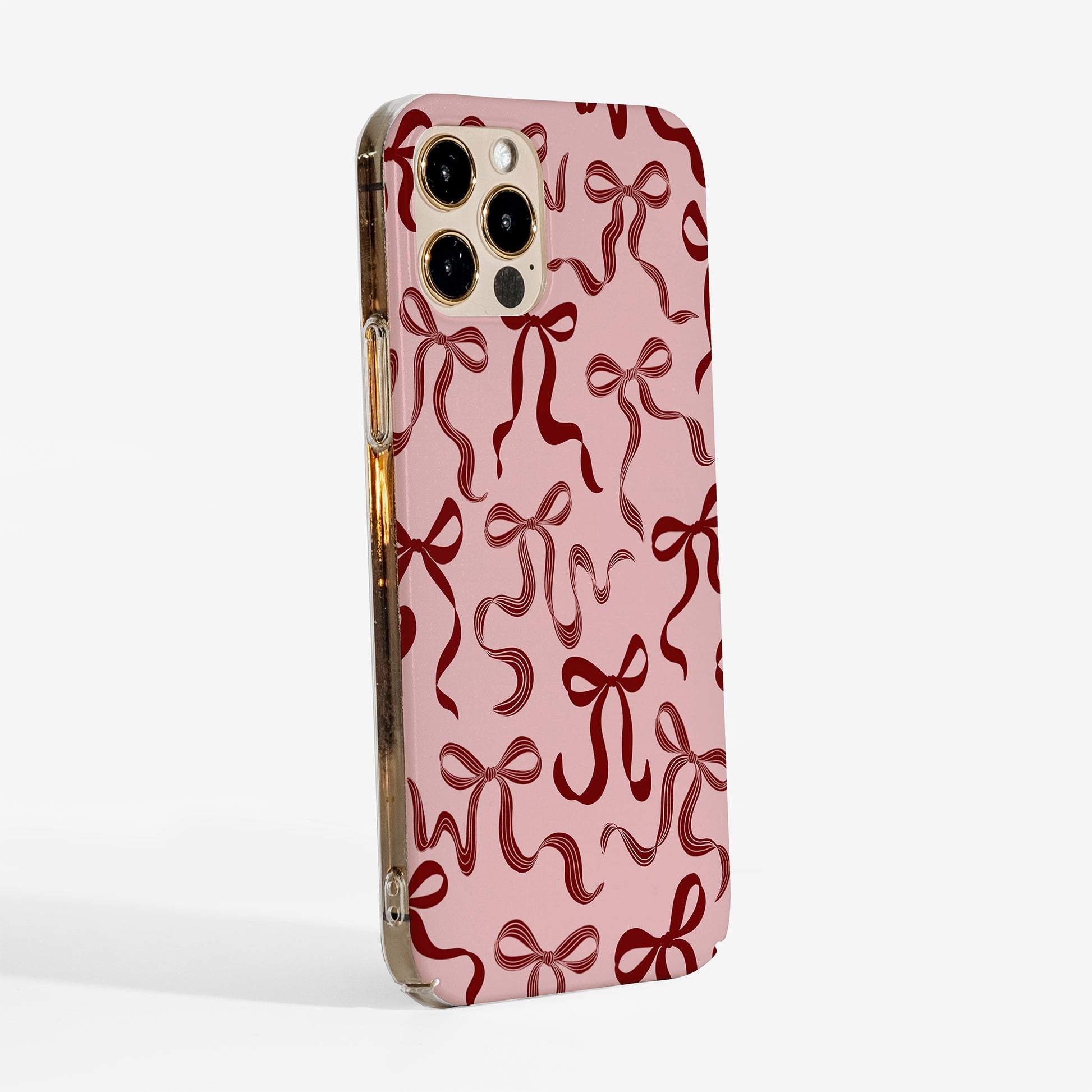 Side view of Christmas Bows phone case showing smooth matte finish and clear sides for a minimal, aesthetic look. Slim yet durable design that fits iPhone and Samsung models.