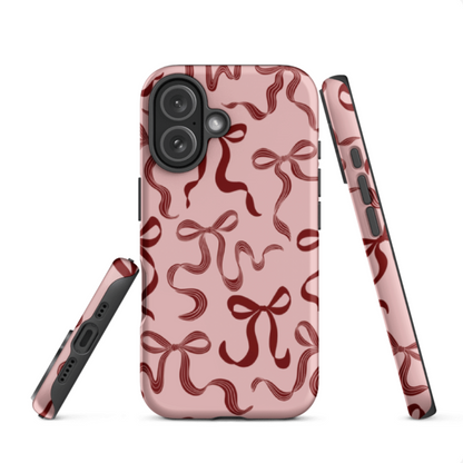 Christmas bows tough iPhone 17 case with glossy print and durable dual-layer protection — cute and festive design for everyday use