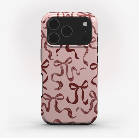 Festive Christmas phone case with elegant ribbons, glossy finish, and dual-layer protection for iPhone, Samsung, and Pixel.