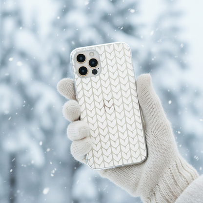 Phone case with a clear knitted pattern held by a hand showing everyday use