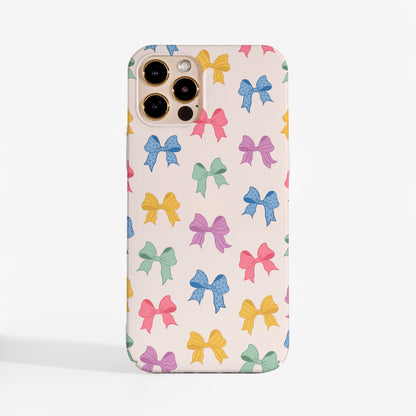 Cute Bow phone case with colourful bow pattern; a designer phone case for women who love playful, stylish tech accessories.
