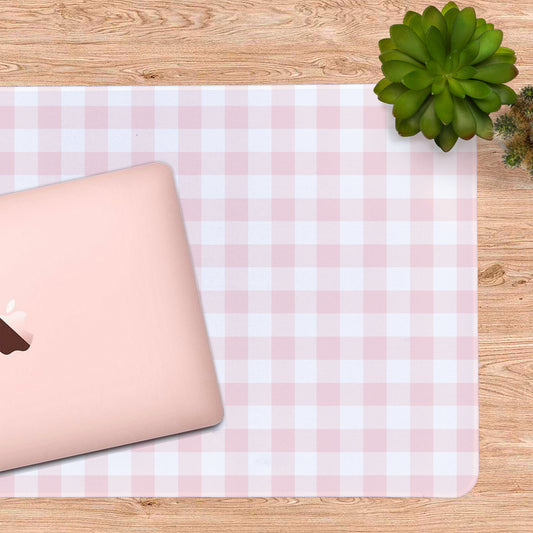 Pastel Pink and white checkered desk mat with a Pink laptop, for a pretty and comfy workplace.