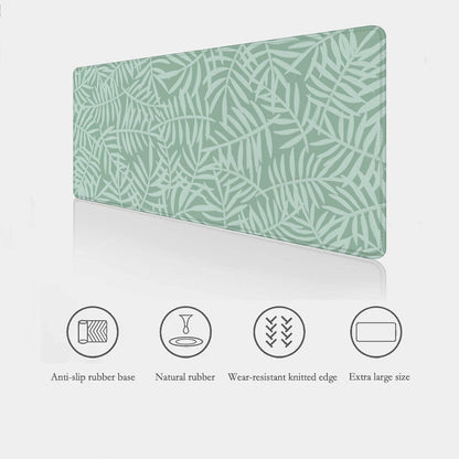 Green Botanical Desk Mat with anti-slip rubber base, sooth waterproof surface and stitched edges features