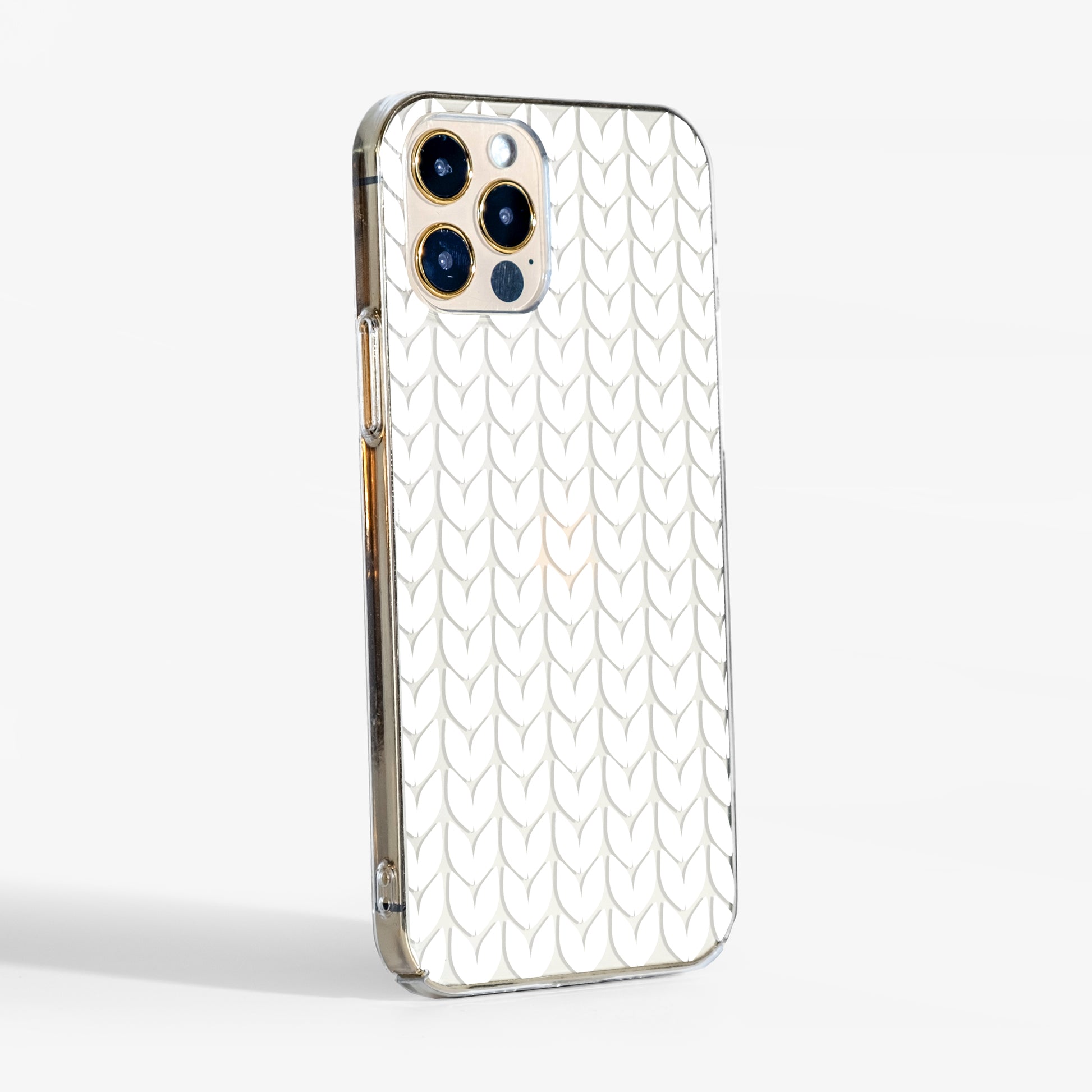 Side view of knitted pattern clear phone case showing transparent sides and cozy winter design.