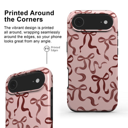 Phone case with pretty bow design showing edge-to-edge print