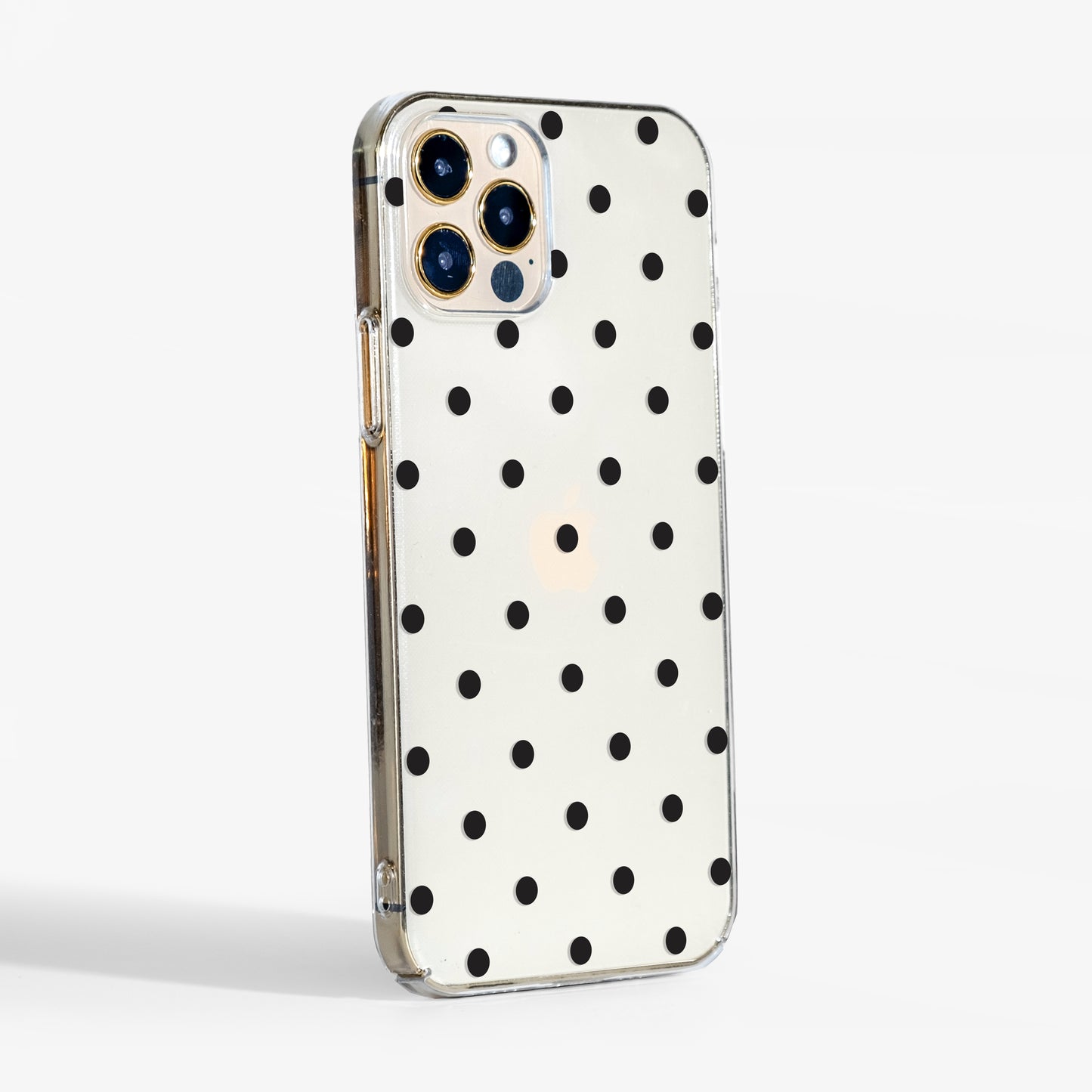 Side view of polka dots clear phone case showing clear edges and lightweight, protective design.