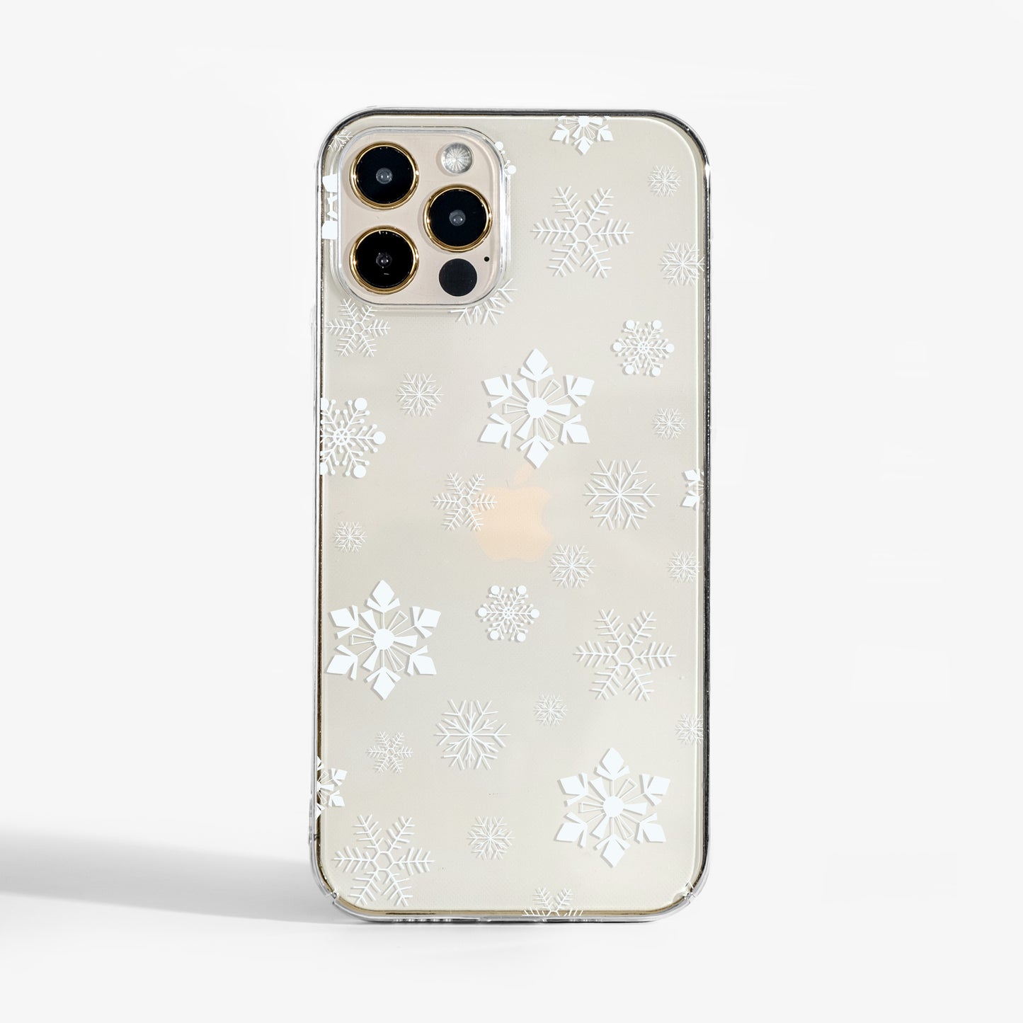 Clear small snowflakes phone case with delicate winter design and smooth matte finish on a transparent background. A stylish protective phone case that adds subtle festive charm.