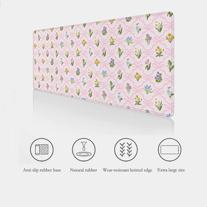 Large desk mat featuring a vintage wildflower and pink bow design, providing a smooth surface for working, writing and everyday desk use.